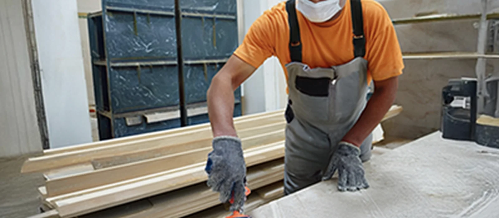 Craftsperson finishing a natural stone surface