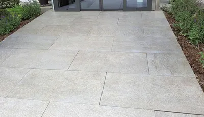 Slip resistance of marble, travertine and limestone surfaces in wet and dry conditions